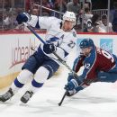 Avalanche survive in OT against Lightning and more scenes from Game 1