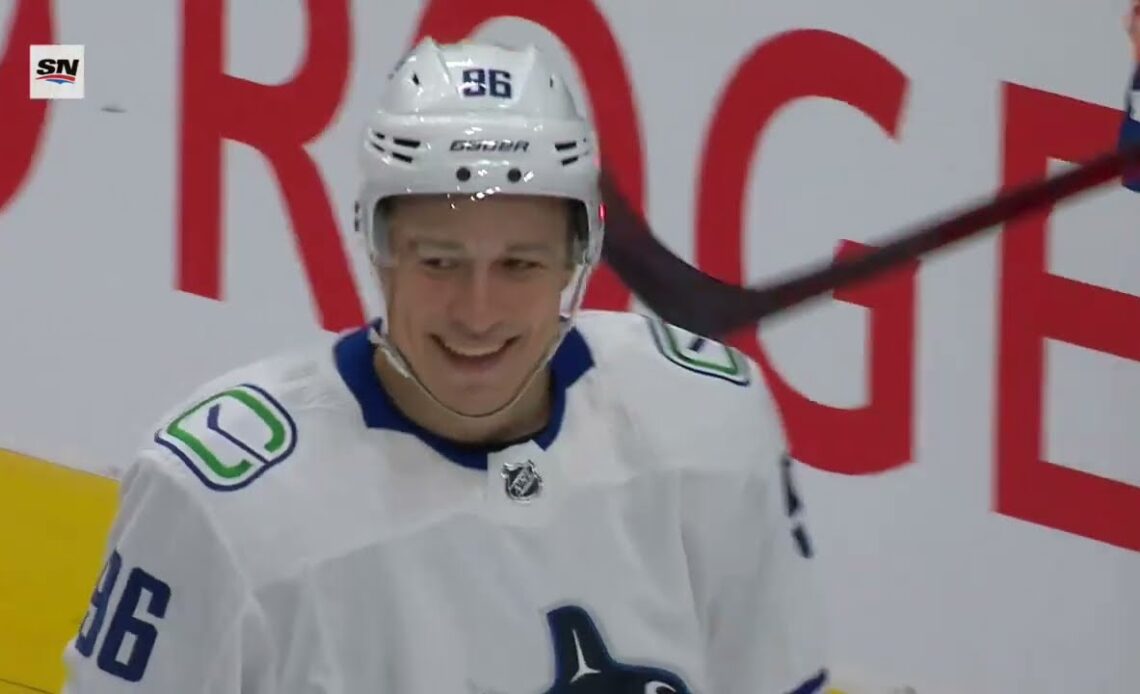 First NHL goal for Andrei Kuzmenko and it's a beauty!