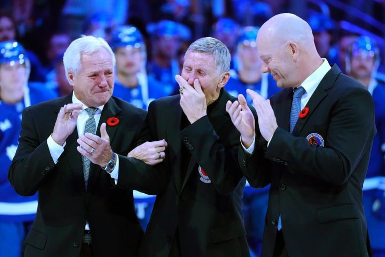 Former Toronto Maple Leafs players and members of the Hockey Hall of Fame, Darryl Sittler, left to right, Borje Salming and Mats Sundin take part in  a pregame ceremony prior to NHL hockey action between the Toronto Maple Leafs and Pittsburgh Penguins, in Toronto, Friday, Nov. 11.