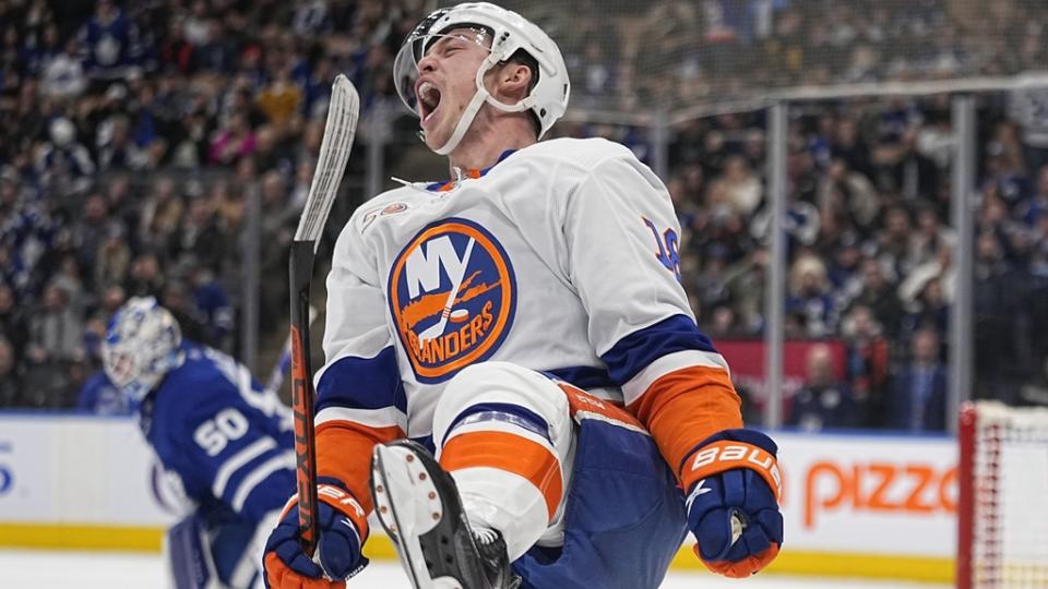 New York Islanders forward Anthony Beauvillier (18) celebrates his overtime goal against Toronto Maple Leafs goaltender Erik Kallgren (50) at Scotiabank Arena