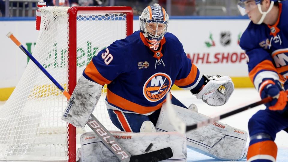 Caption: Nov 23, 2022; Elmont, New York, USA; New York Islanders goaltender Ilya Sorokin (30) makes a save against the Edmonton Oilers during the first period at UBS Arena.