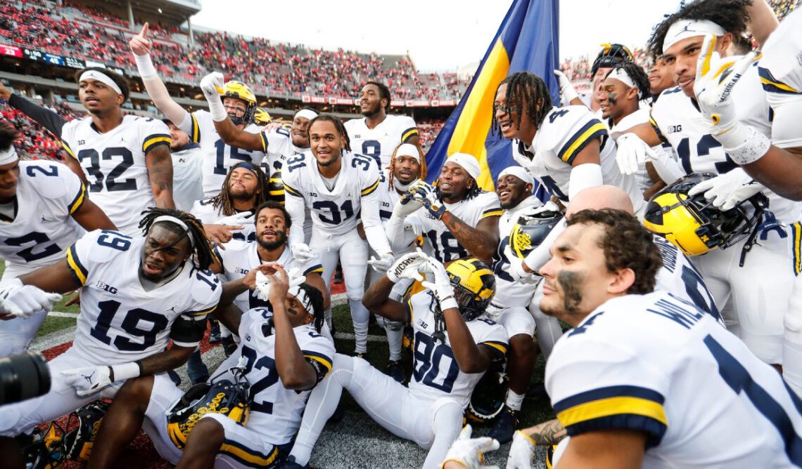 Michigan Football Team Takes Ice at Hockey Game; Shooed Off By Ref