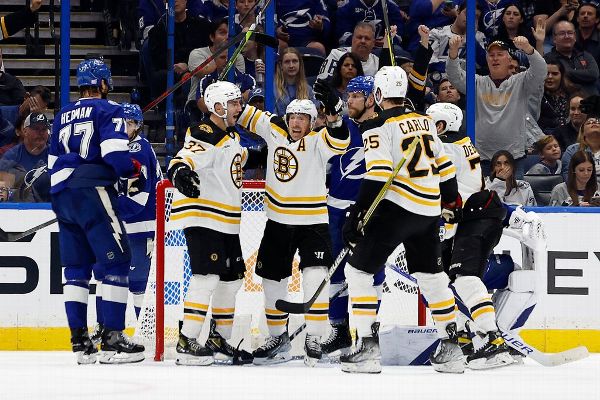 Patrice Bergeron gets 1,000th point with assist in Bruins' win