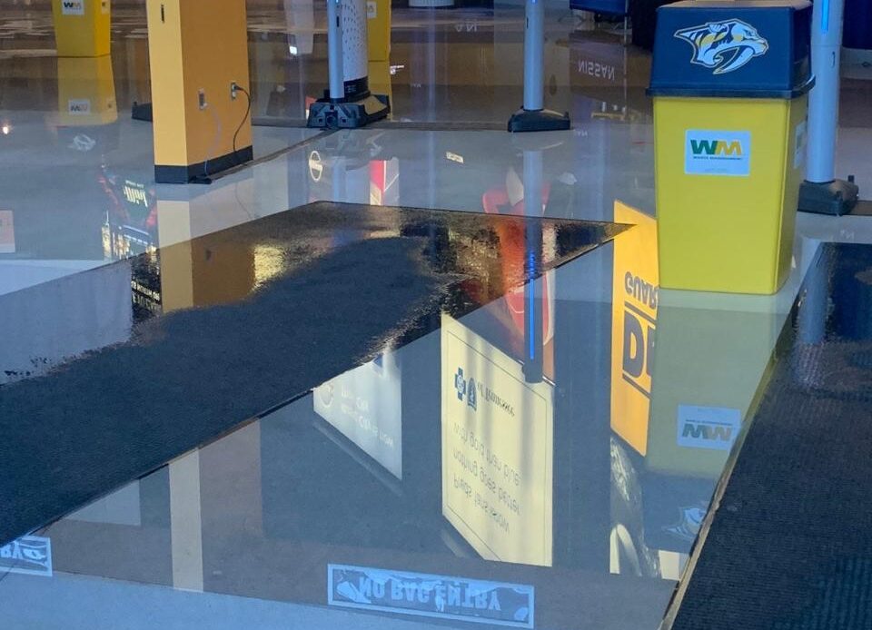 Standing water was visible inside Bridgestone Arena after a water main break early Friday morning.