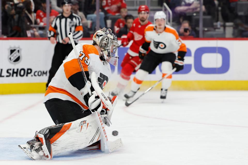 Philadelphia Flyers goaltender Carter Hart (79) makes the save in the second period against the Detroit Red Wings at Little Caesars Arena in Detroit on Saturday, Jan. 21, 2023.