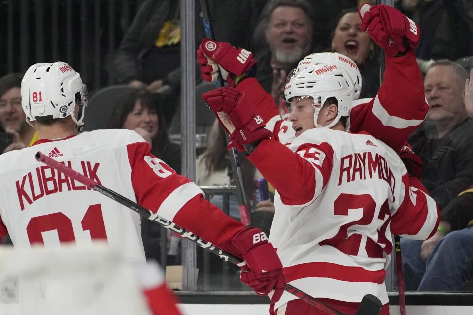 Red Wings left wing Lucas Raymond, right, celebrates after scoring against the Golden Knights during the first period on Thursday, Jan. 19, 2023, in Las Vegas.