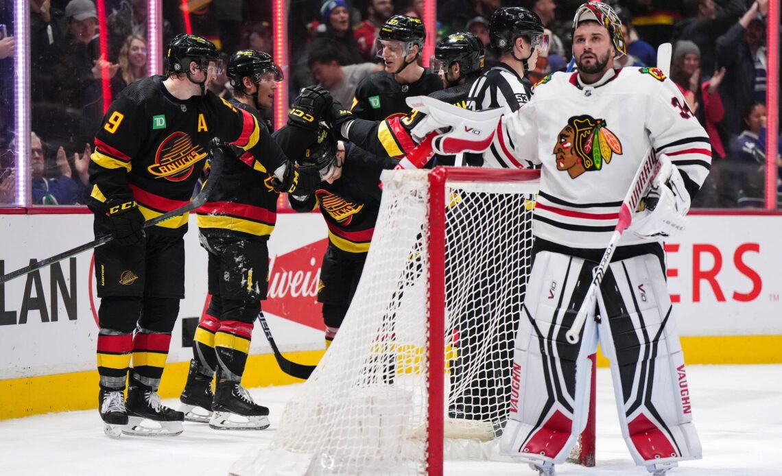 Vancouver rallies in 3rd period to beat Chicago in Tocchet's coaching debut with Canucks