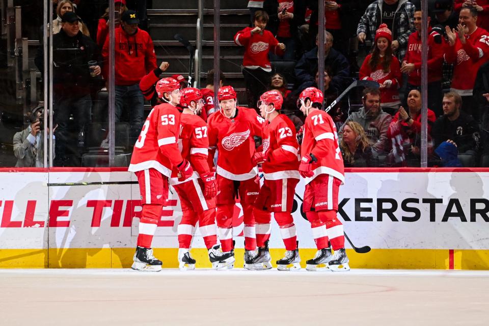 Detroit Red Wings celebrate the goal from right wing Alex Chiasson (48) during the first period against the Boston Bruins at Little Caesars Arena, March 12, 2023.
