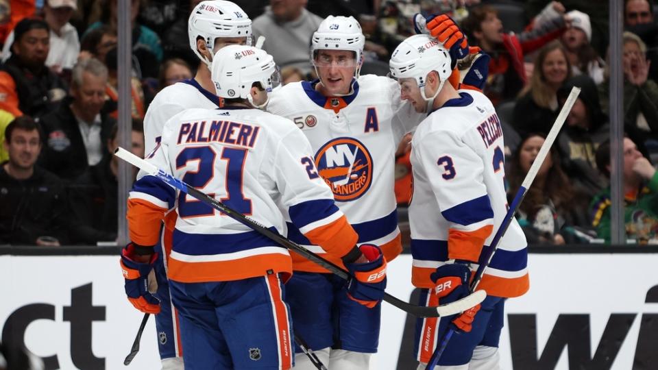 Mar 15, 2023; Anaheim, California, USA; New York Islanders forward Brock Nelson (29) celebrates with teammates after scoring a goal during the second period against the Anaheim Ducks at Honda Center.