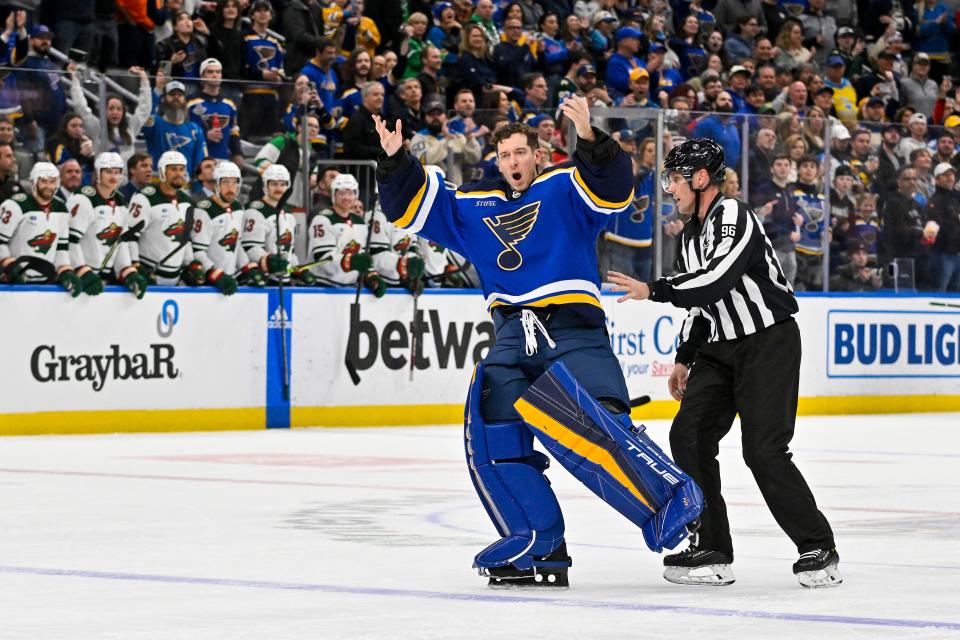 St. Louis Blues goaltender Jordan Binnington hypes up the crowd after he was ejected from Wednesday's game against the Minnesota Wild.
