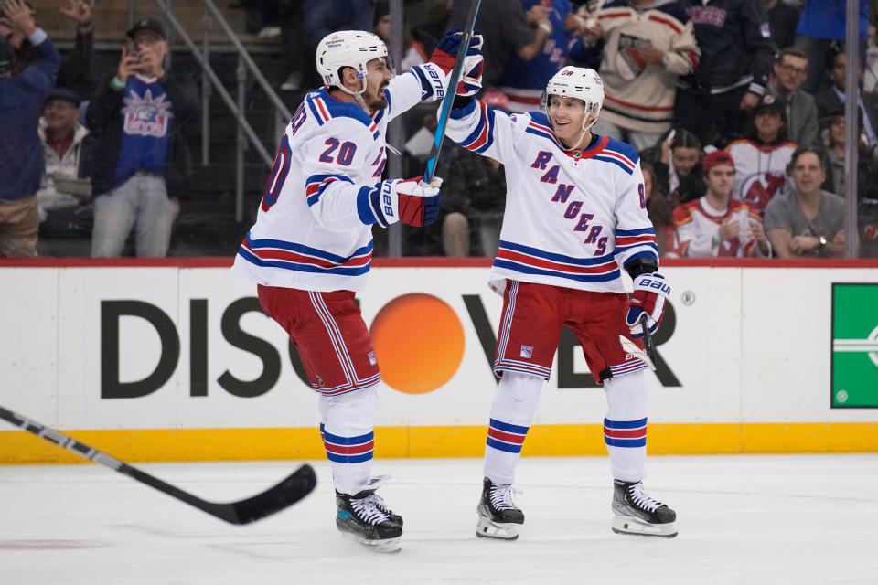 New York Rangers' Chris Kreider, left, celebrates his goal with Patrick Kane during the first period of Game 1 of an NHL hockey Stanley Cup first-round playoff series against the New Jersey Devils in Newark, N.J., Tuesday, April 18, 2023.