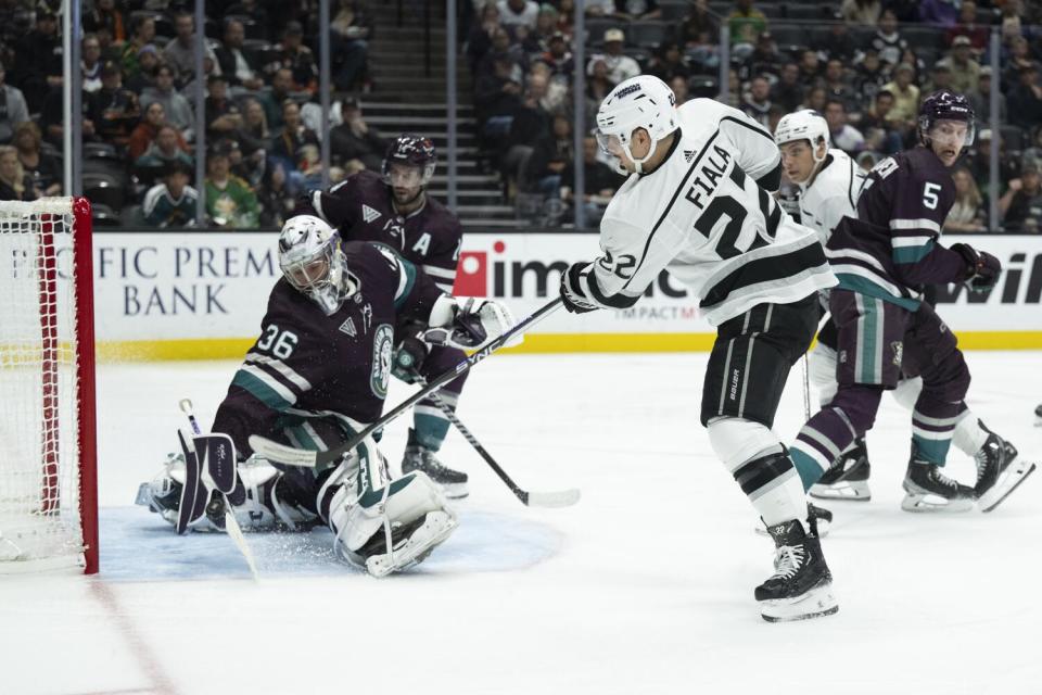 Kings left wing Kevin Fiala scores past Ducks goaltender John Gibson during the second period Friday in Anaheim.