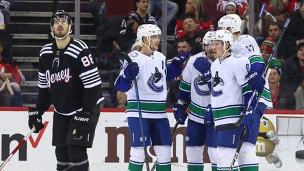 Devils comeback falls short in 6-4 loss to Canucks