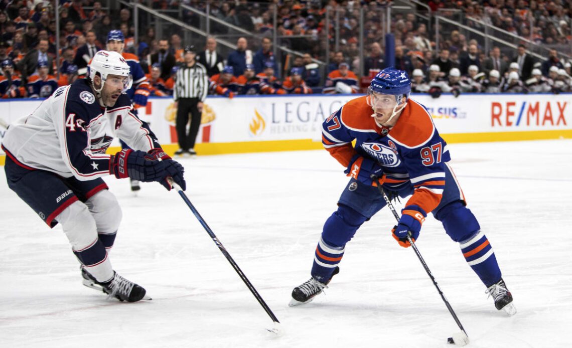 Oilers beat Blue Jackets 4-1 for 14th straight victory, close within 3 wins of the NHL record