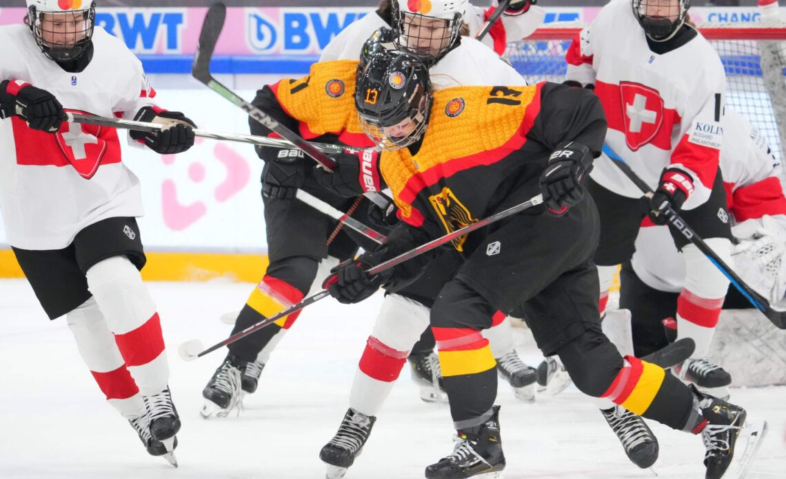 Swiss stay in top division