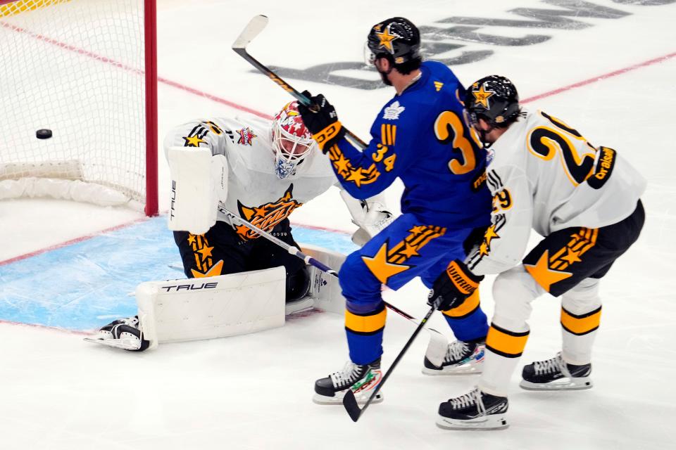 Team Matthews center Auston Matthews (34) of the Toronto Maple Leafs scores a goal against Team McDavid goaltender Sergei Bobrovsky (72) of the Florida Panthers in the 2024 NHL All-Star Game at Scotiabank Arena.