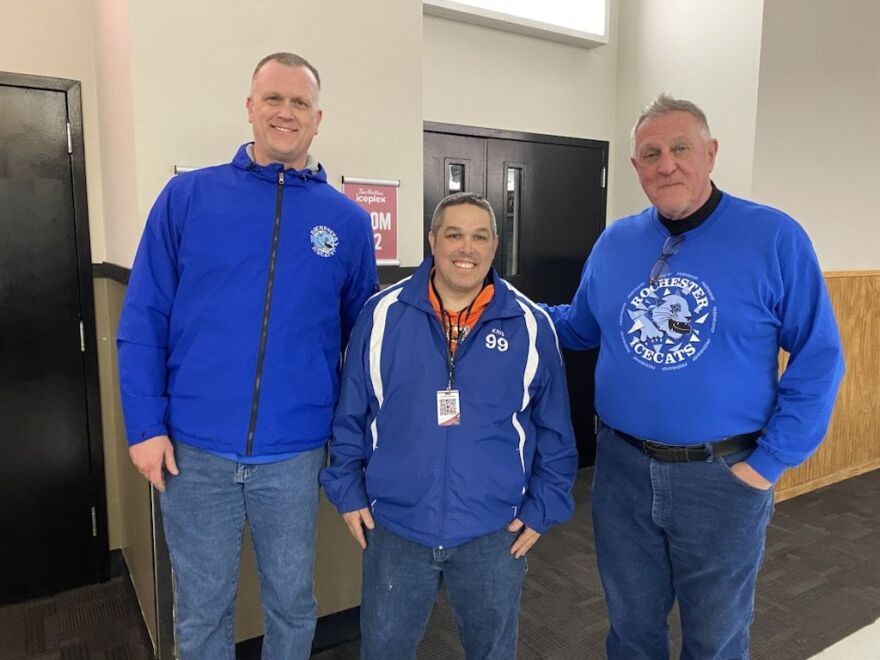 Rochester Ice Cats members (L-R) : Board member Randall Trahan, Captain Kris Carter and Coach Tom Simmons