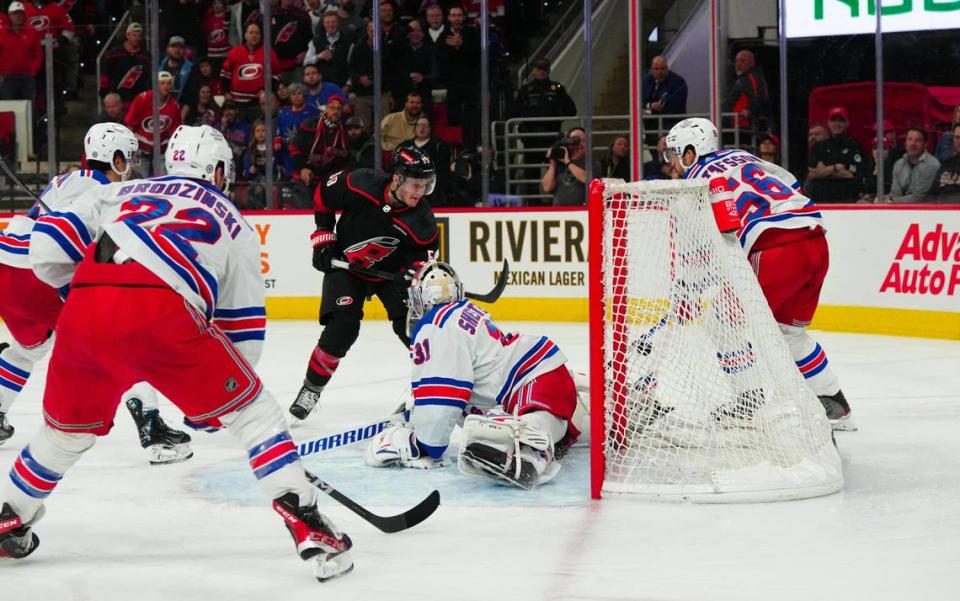 Mar 12, 2024; Raleigh, North Carolina, USA; New York Rangers goaltender Igor Shesterkin (31) stops the shot in close by Carolina Hurricanes left wing Jake Guentzel (59) during the third period at PNC Arena. Mandatory Credit: James Guillory-USA TODAY Sports