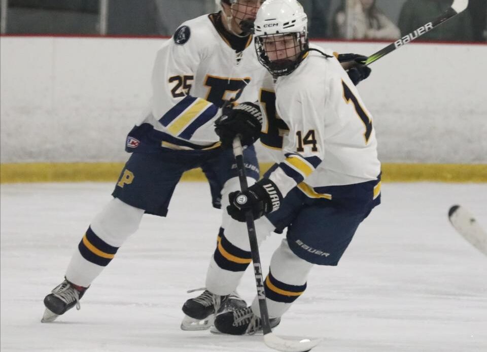 Griffin Evans from Pelham controls the puck during the Pelham vs. Byram Hills Section One Division II hockey championship at the Brewster Ice Arena in Brewster, Feb. 25, 2024.