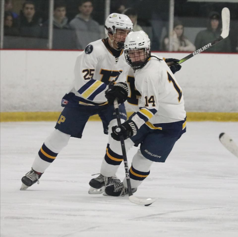 Griffin Evans from Pelham controls the puck during the Pelham vs. Byram Hills Section One Division II hockey championship at the Brewster Ice Arena in Brewster, Feb. 25, 2024.