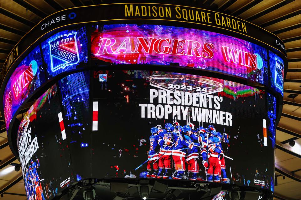 The Madison Square Garden scoreboard displays a graphic for the New York Rangers winning the President’s Trophy after their 4-0 win agains the Ottawa Senators.