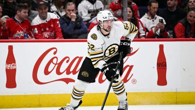 Boston Bruins defenseman Andrew Peeke (52) in action during the second period of an NHL hockey game against the Washington Capitals, Saturday, March 30 2024, in Washington.