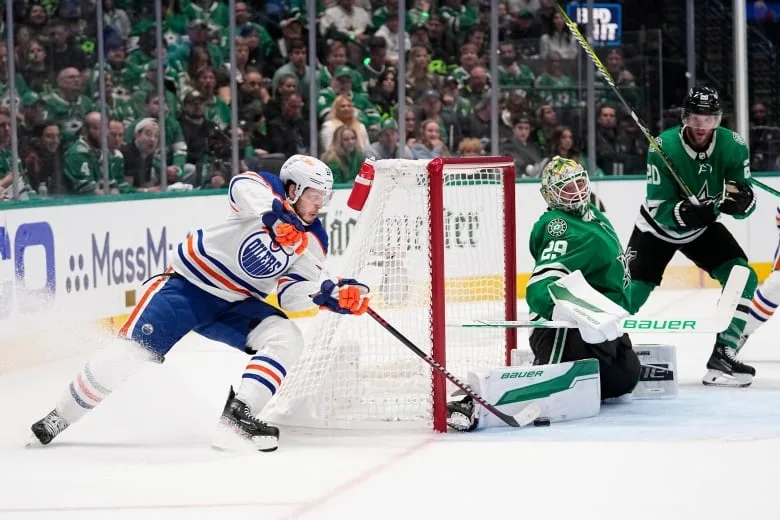 Hockey players battle it out in the rink