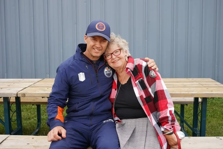 Oilers assistant coach Glen Gulutzan (left) is from Hudson Bay. Mayor Betty Lou Palko says the entire community will be watching Game 7, and have been greeting each other in town by saying "Go Oilers! Go Gully!"