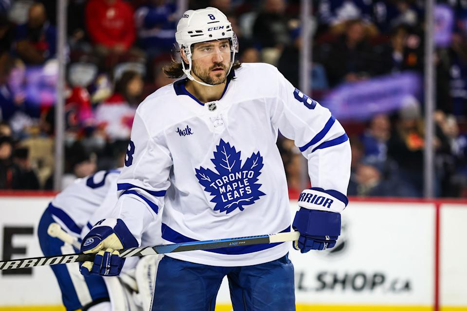 Feb 4, 2025; Calgary, Alberta, CAN; Toronto Maple Leafs defenseman Chris Tanev (8) against the Calgary Flames during the second period at Scotiabank Saddledome. Mandatory Credit: Sergei Belski-Imagn Images